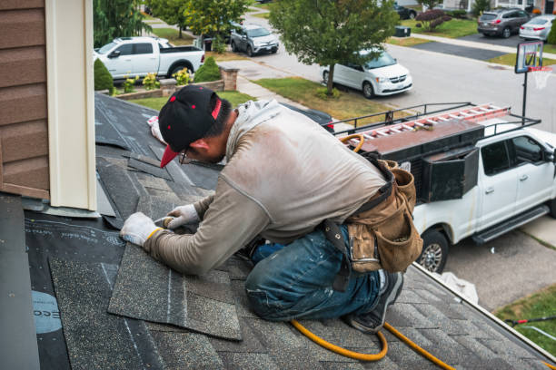 Professional Roofing technician working in Burton, OH